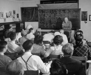 black and white vintage photo of students in classroom.