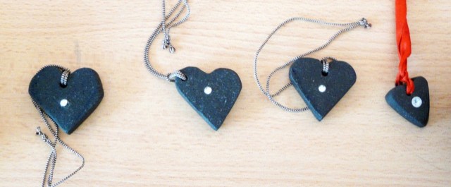 Handcrafted basalt heart-shaped jewelry.